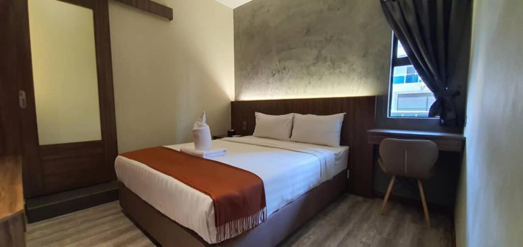Vista Hotel Тавау Екстериор снимка